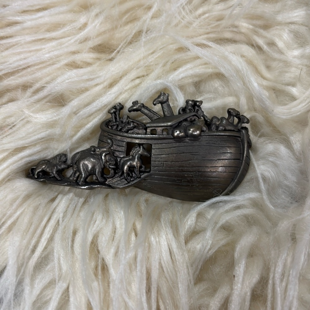 Noah’s ark pin “A.J.C” on inside